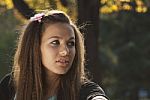 Young Woman In The Park Stock Photo