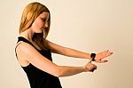 Young Woman Is Touching The Apple Watch Stock Photo