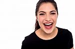 Young Woman Laughing Loud Stock Photo