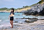 Young Woman On Beach Summer Holiday Stock Photo