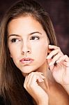 Young Woman On Dark Background Stock Photo