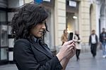 Young Woman Photographing With Cell Phone Stock Photo