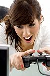 young Woman Playing Video game Stock Photo