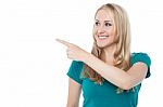 Young Woman Pointing Out Right Stock Photo