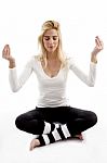 Young Woman Practicing Yoga Stock Photo