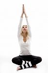 Young Woman Practicing Yoga Stock Photo