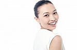 Young Woman Smiling Against White Stock Photo