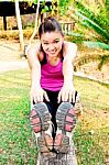 Young Woman Stretching Before Exercise Stock Photo