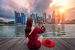 Young Woman Take A Photos In Singapore Stock Photo