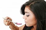 Young Woman Taking Medicine Stock Photo