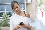 Young Woman Text Messaging Stock Photo