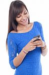 Young Woman Text Messaging Stock Photo