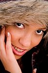 Young Woman Wearing Hood Stock Photo