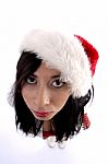 Young Woman wearing santa hat Stock Photo