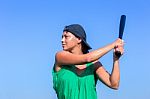 Young Woman With Baseball Bat And Cap Stock Photo