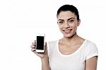 Young Woman With Blank Smartphone Screen Stock Photo