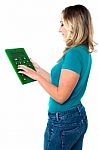 Young Woman With Calculator Stock Photo