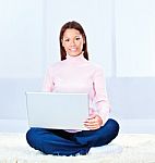 Young Woman With Laptop Stock Photo