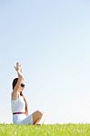 Young Women Sitting And Doing Meditating Stock Photo